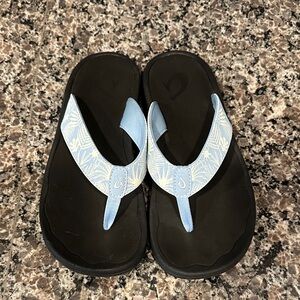OluKai Ohana Black and Light Blue Flip Flops